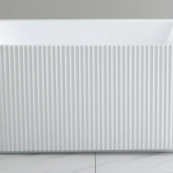 Bassini back To Wall Fluted Bath